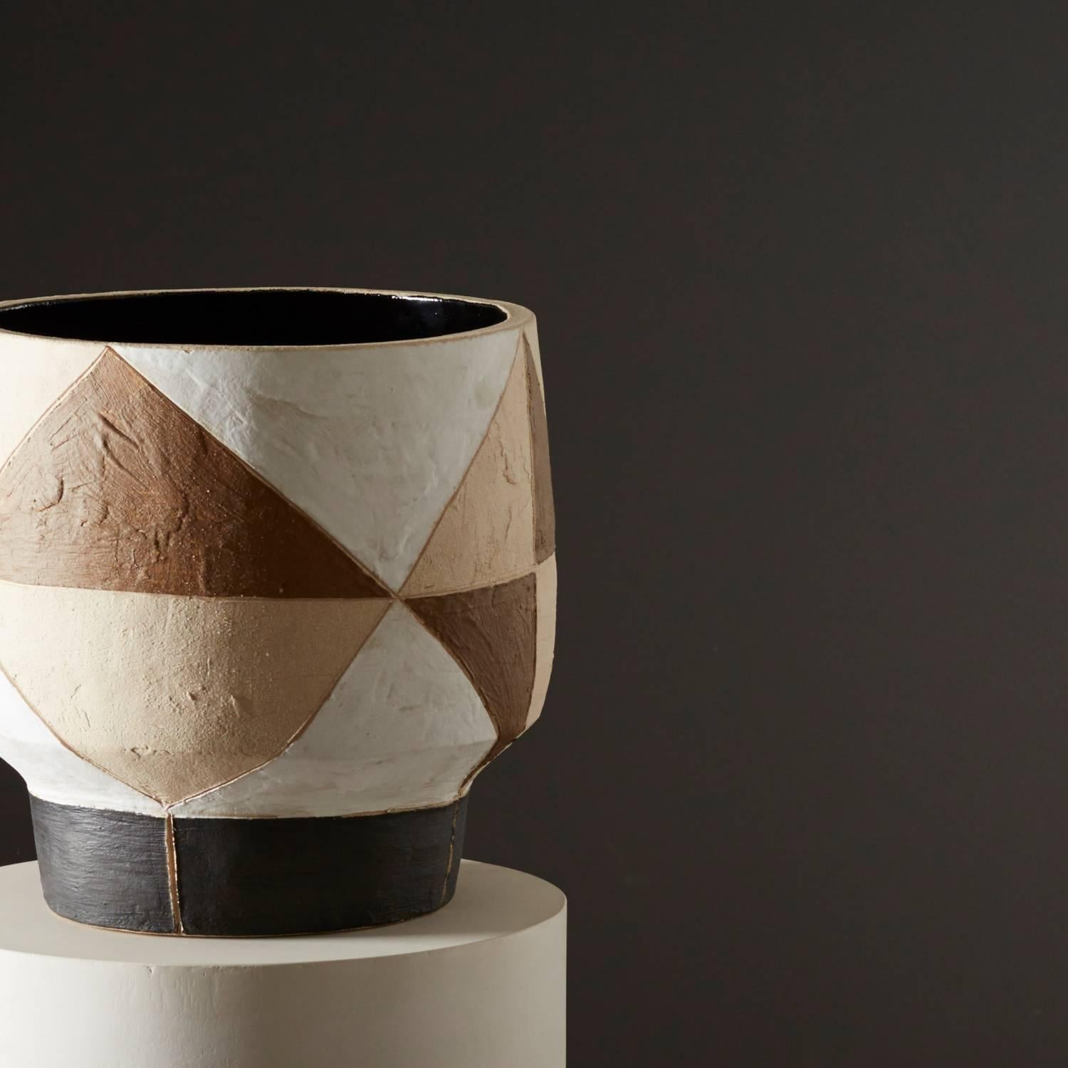 Daniel Reynolds' cinnamon, chalk and obsidian geometric pot is part of a handmade ceramics range inspired by the methods of the ancients

Daniel’s large hand built pots operate as striking focal points, helping to define larger spaces, highlight