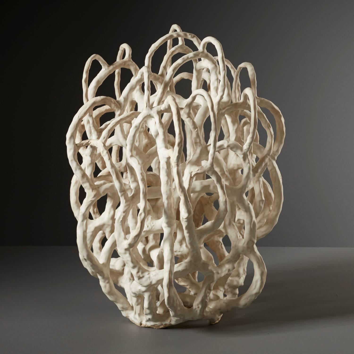 Daniel Reynold’s ‘White Rope Abstraction’ is an abstract sculptural piece. An exercise in the art of capturing movement through clay. Organic in form, and hand built in stoneware clay, this lively work is carefully detailed to capture the light and