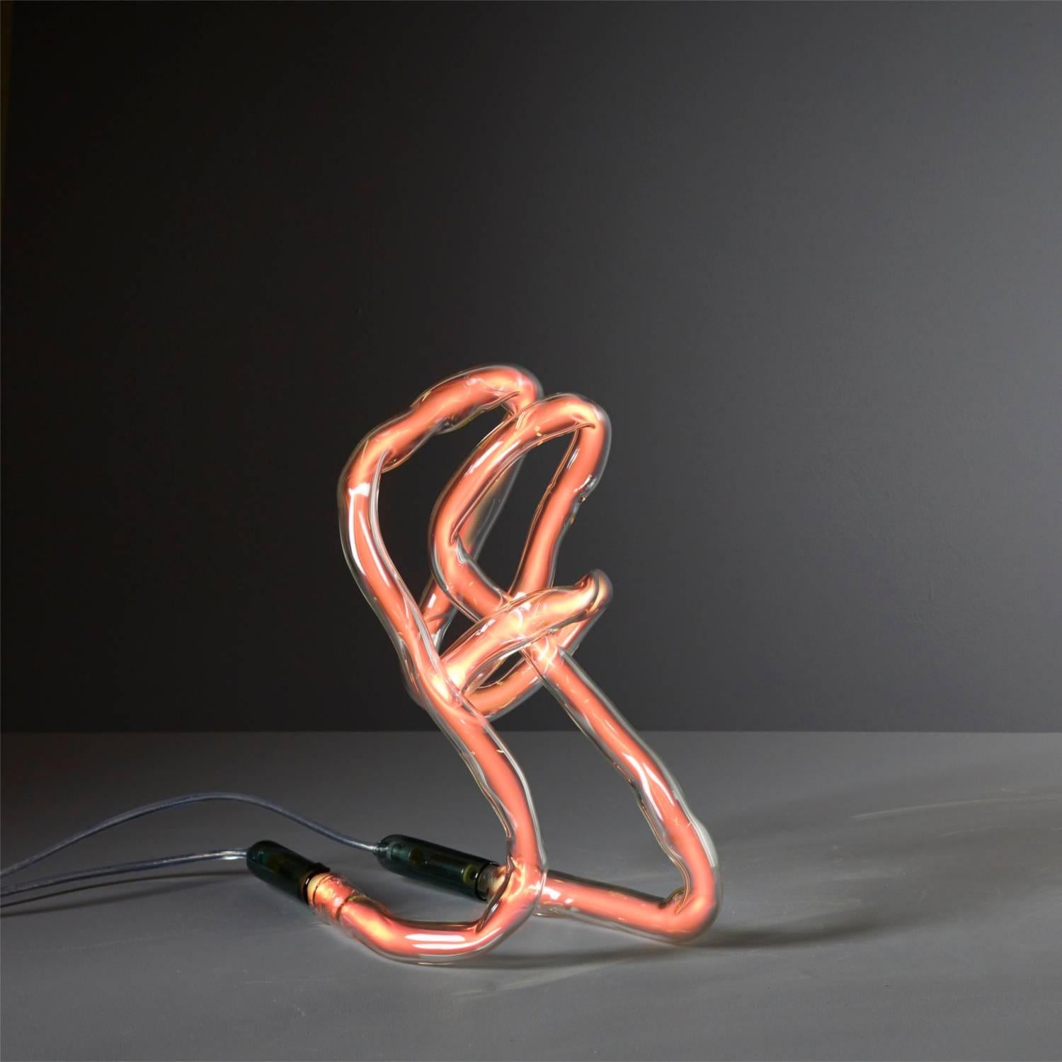 The ‘Helium table light’ by Jochen Holz is a unique, freestanding light sculpture made of borosilicate glass tubing. Each lamp is one-of-a-kind, from a small batch edition. The lights have an estimated lifetime of about 30 to 40 thousand