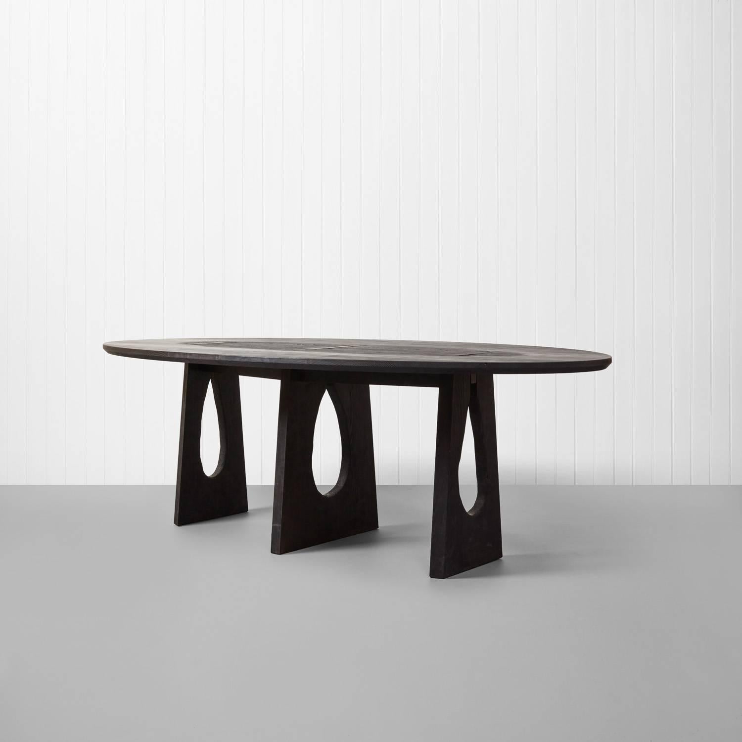 Scorched ash dining table by Sebastian Cox, an exclusive, one off piece constructed from solid Ash and blackened on the exterior. 

A large dining table by celebrated furniture maker Sebastian Cox constructed in solid Ash with a scorched,