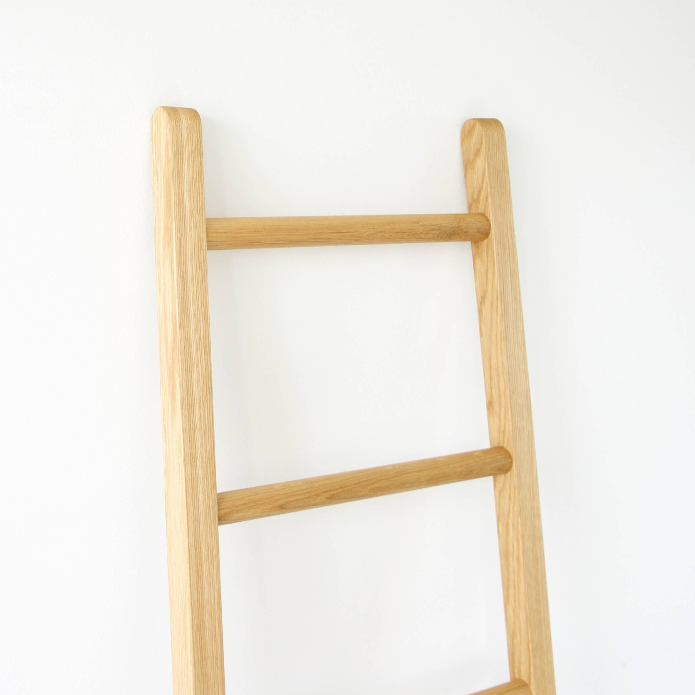 A solid white oak towel ladder with some unique design elements. Built incredibly strong with mortise and tenon joinery and hand finished with a low voc oil and wax.
 