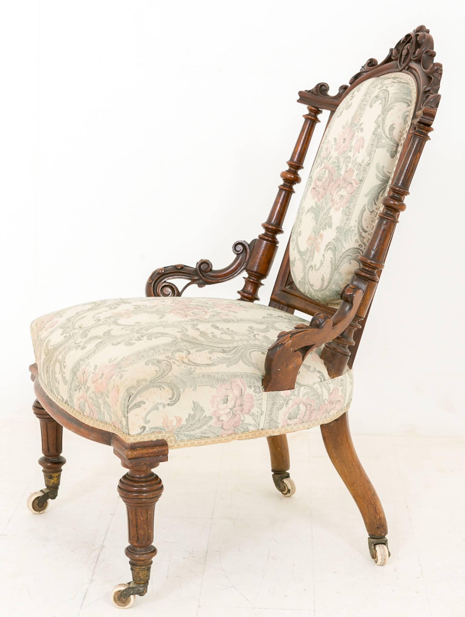 Pair of Victorian walnut his and hers salon chairs.
Standing on porcelain castors, turned legs and beautiful carved arms.
The stunning turned columns to the back of the chairs terminating in pierced carvings to the top rails.

Size:
Ladies