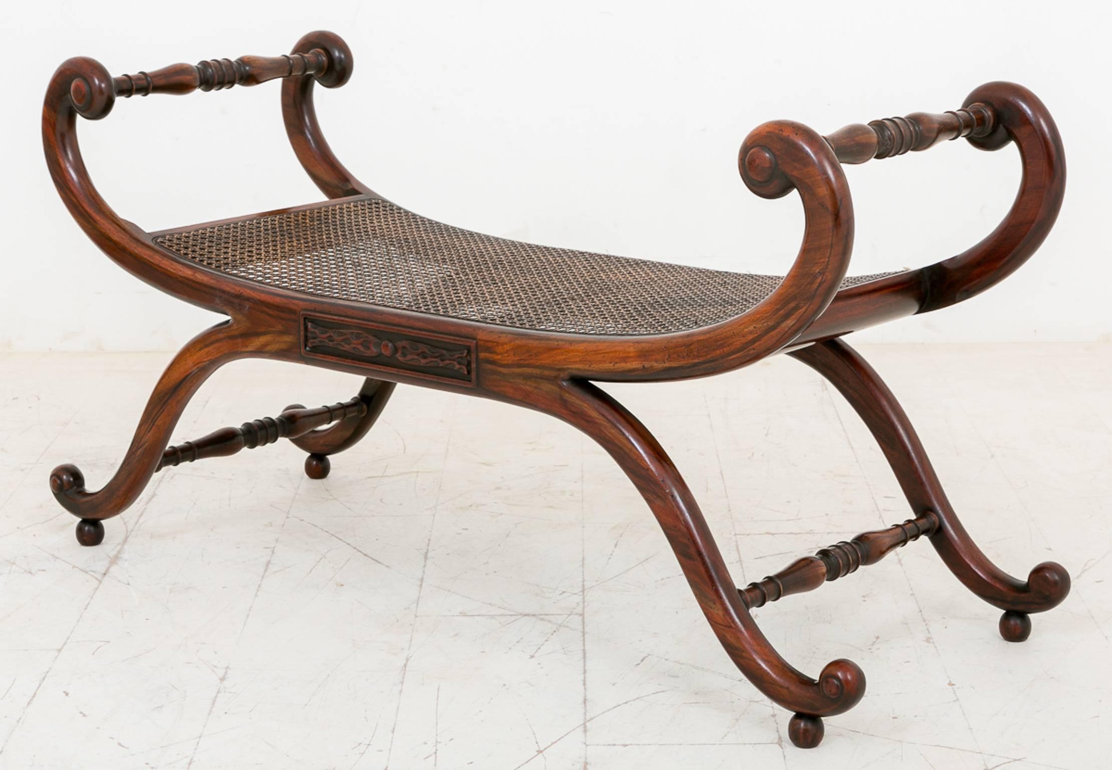 Here we have an unusual pair of simulated rosewood stools, standing on swept legs with ring turned stretchers.
The stools feature a carved panel and cane seats.

Size:
Maximum height 23