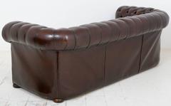Pair of Deep Buttoned Leather Chesterfields