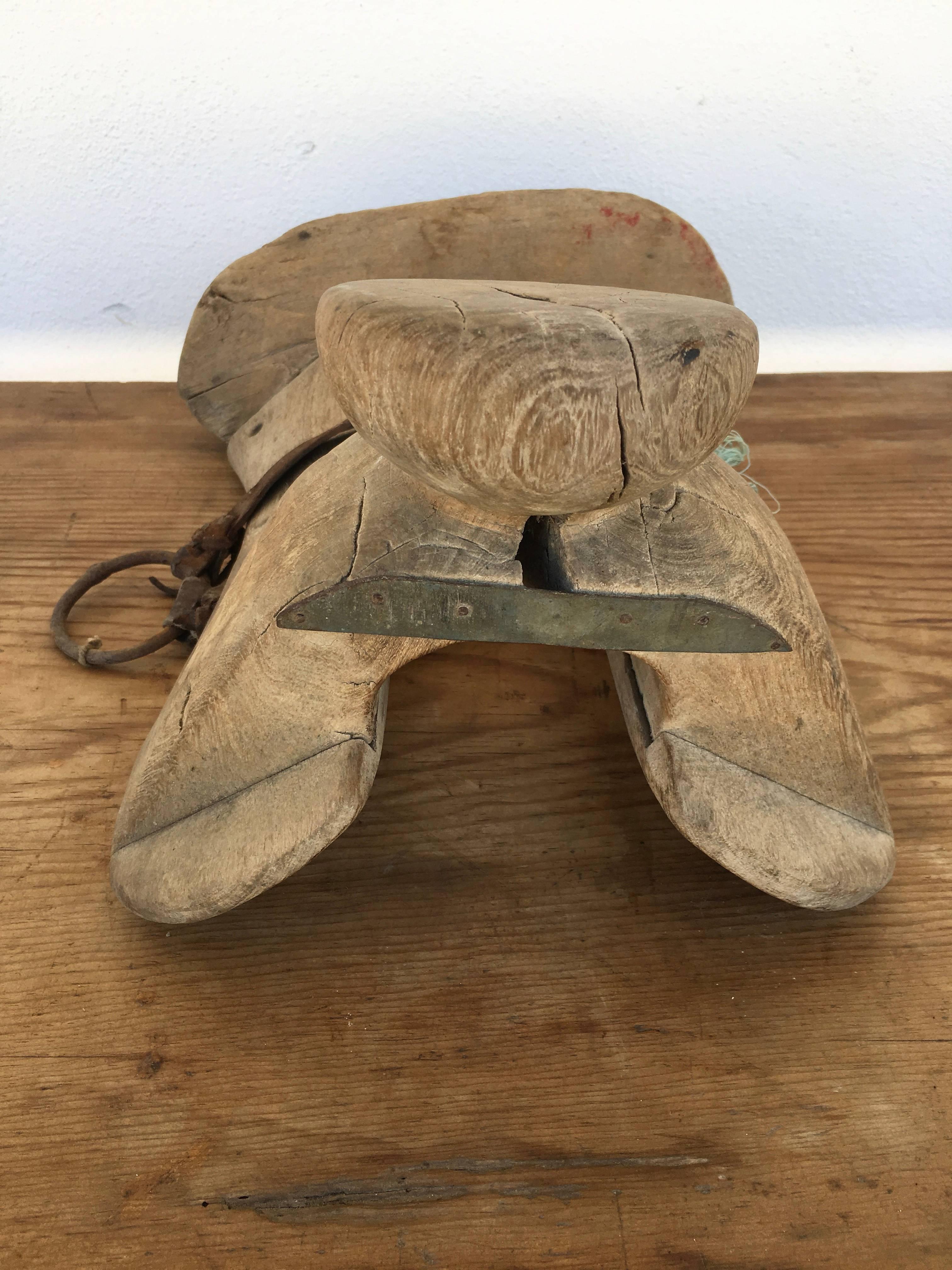 Rustic, mesquite saddle with original iron hardware and leather strapping from Guanajuato, Mexico.