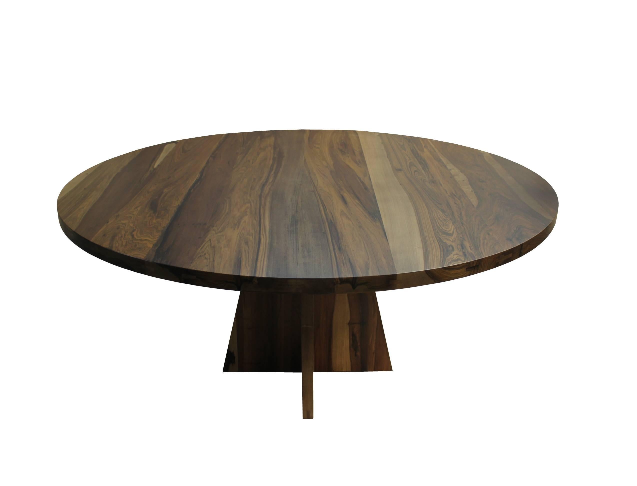 The Luca Table is one of Costantini’s signature and most specified pieces. It is shown in Argentine Rosewood, a species known for its hardness as well as its heavy graining. The design itself is understated and architectural in nature and lets the