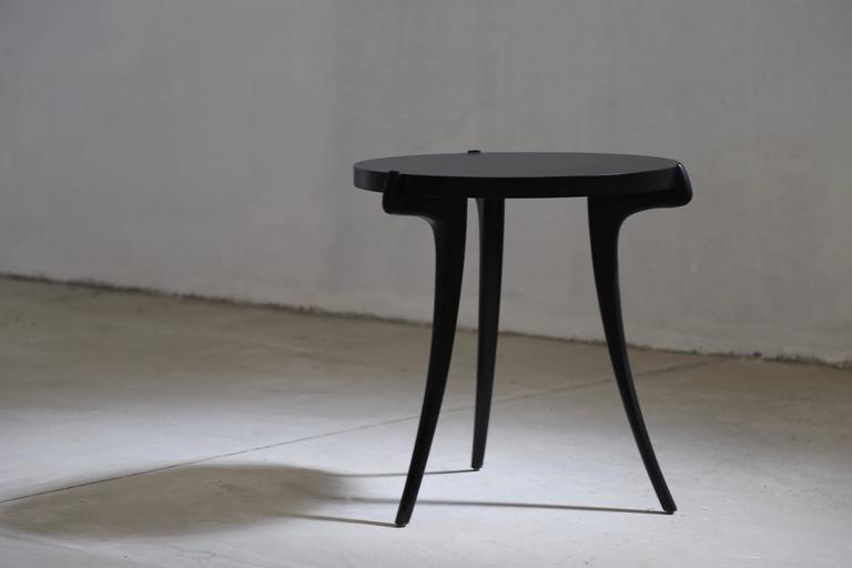 The Uccello Ebonized Wood Sabre-Leg Cocktail Table from Costantini, In Stock 

Measurements are 18.5 Diameter x 22.5