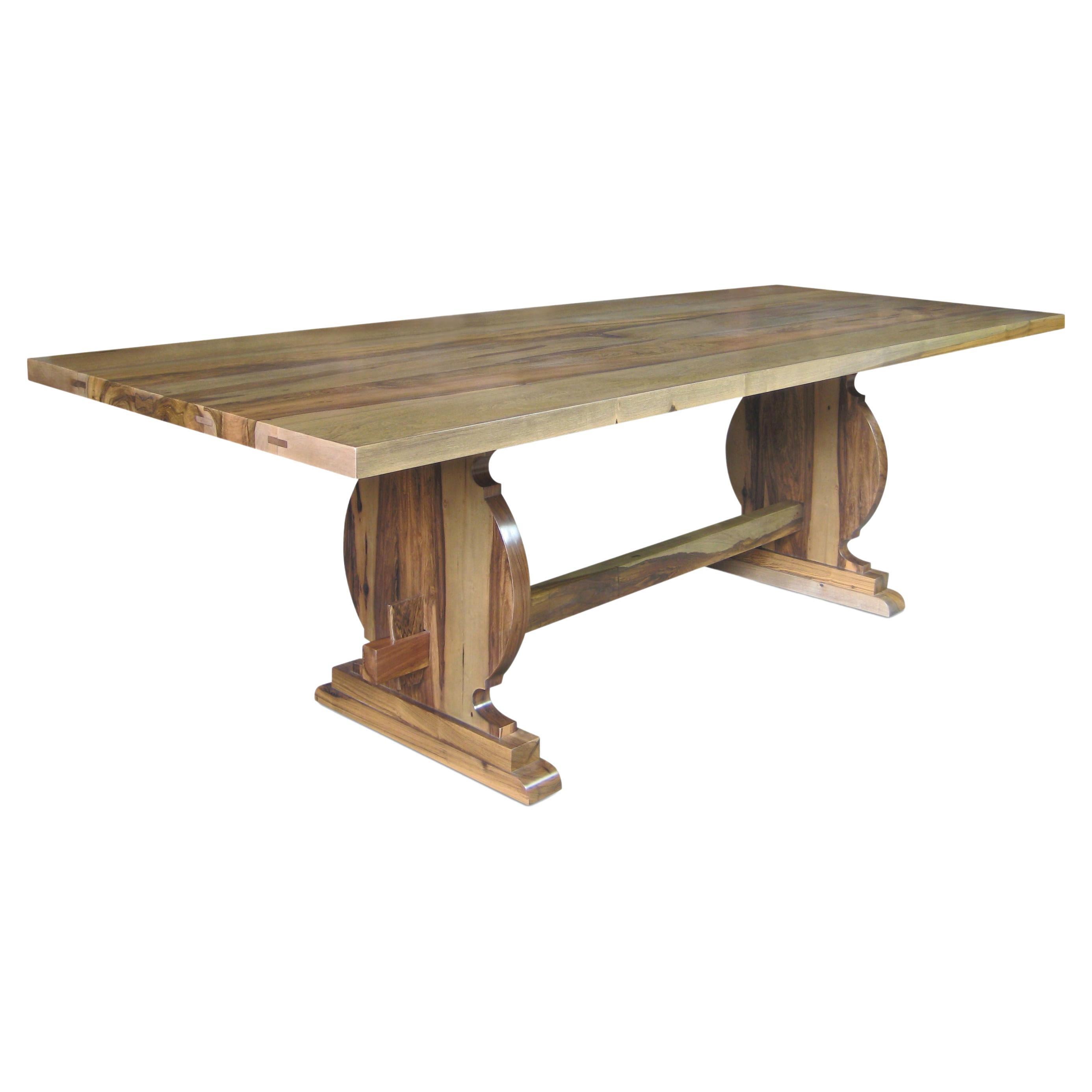 The Manolo Table features a Basque-inspired trestle base and is shown here in Cerused Oak.  We offer more than 30 different species of woods and various finishes in each, as well as custom finishes.  

Measurements are: 84