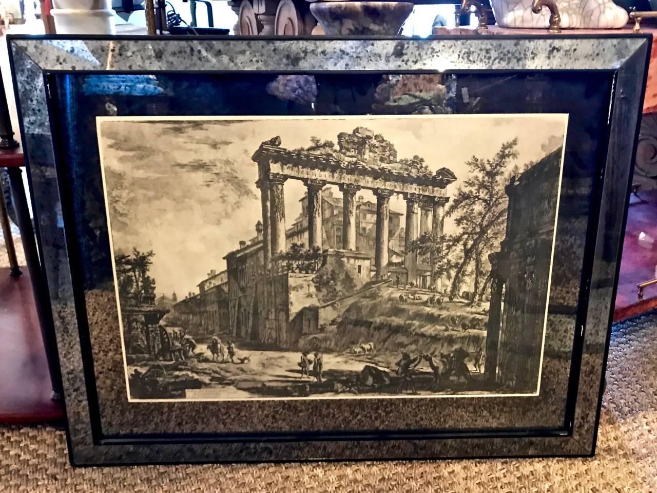 Pair of very decorative 19th c. Piranesi engravings that have been beautifully framed in mirrored frames and mats, most probably dating to the 1980s.