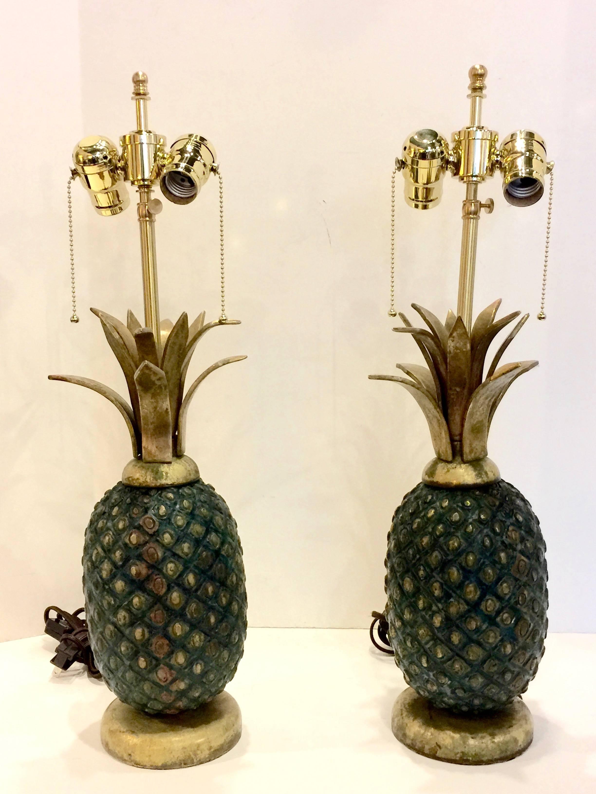 This is a superb pair of pineapple lamps by the famed Mexican modernist master, Pepe Mendoza. These heavy lamps were crafted in solid brass and are in excellent original condition with the exception of updating with new top quality electrical