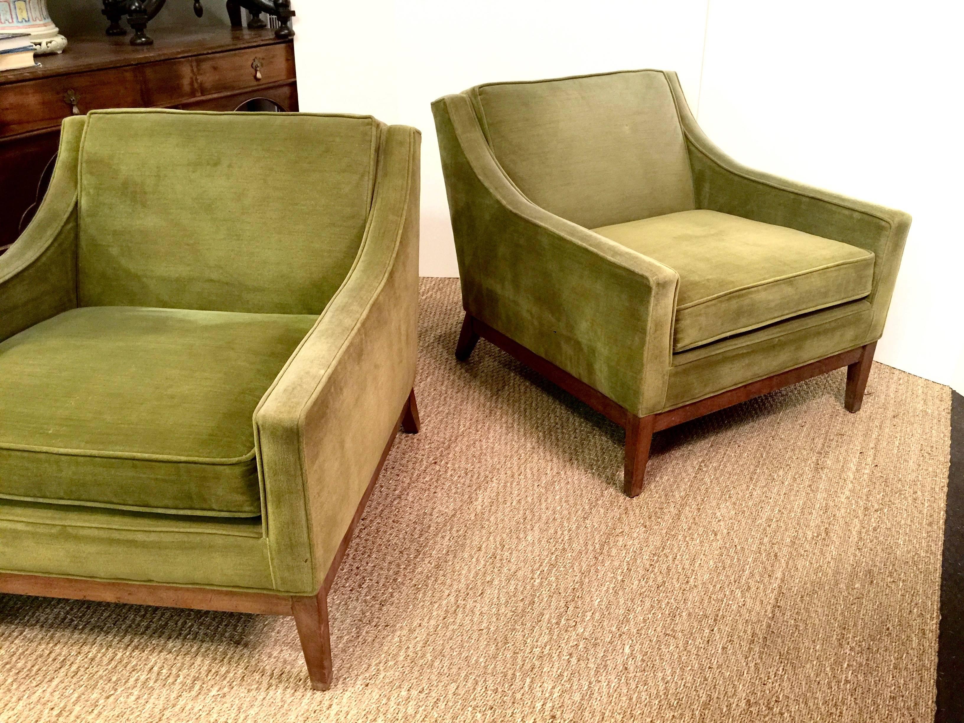 This is a very rare pair of Cal-Mode (name of Monteverdi-Young during 1st year of operation) club chairs that have retained their original lime green velvet upholstery and wood surface. The chairs date to the late 1950s and are in overall very good