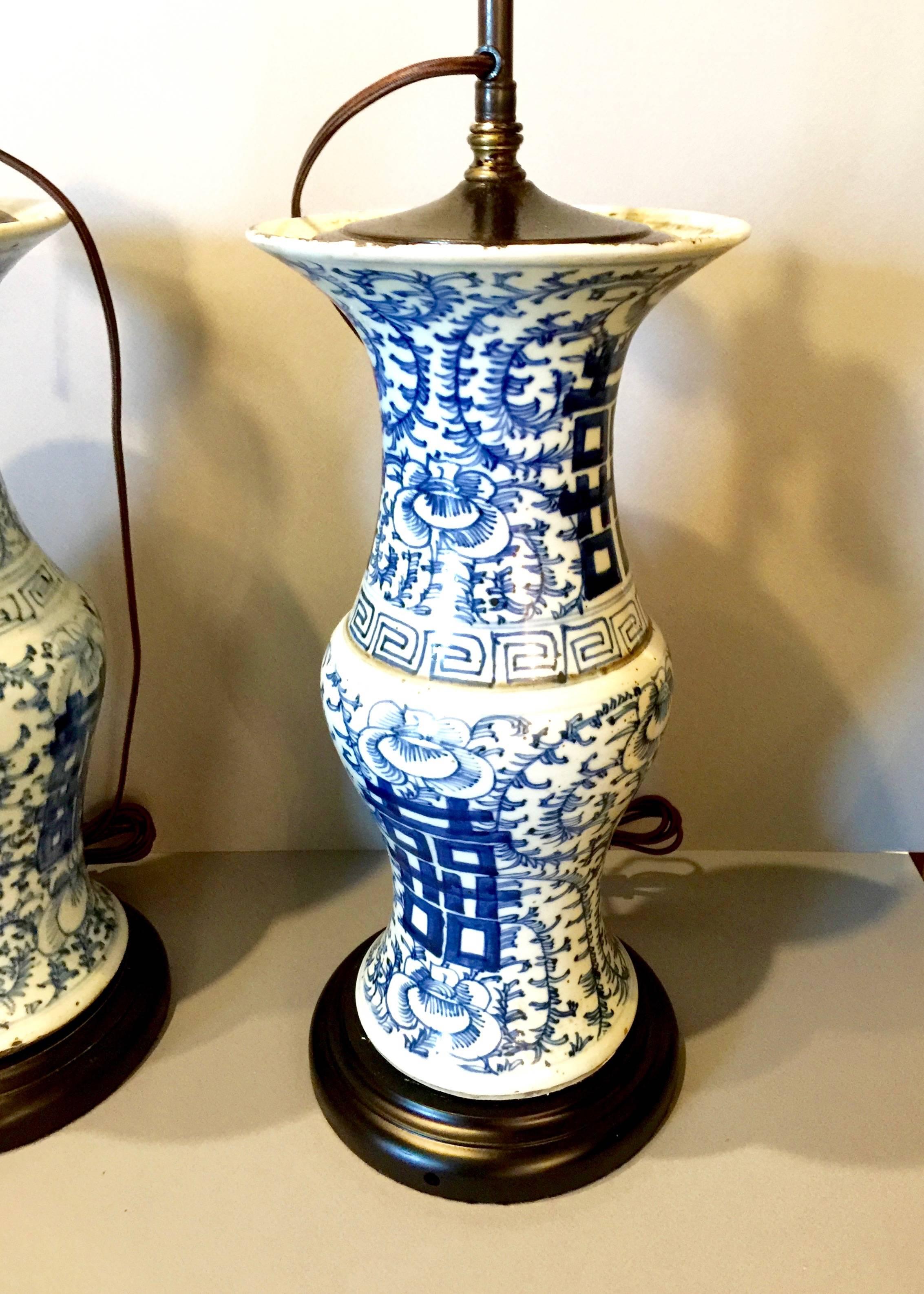 Chinese Export Pair of Late 19th Century Ching Blue and White Chinoiserie Lamps For Sale
