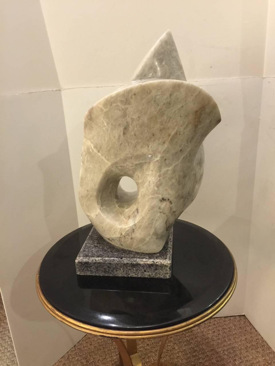 This is a substantial 20th century marble sculpture. The abstract or Brutalist form and graceful movement give life to the sculpture.