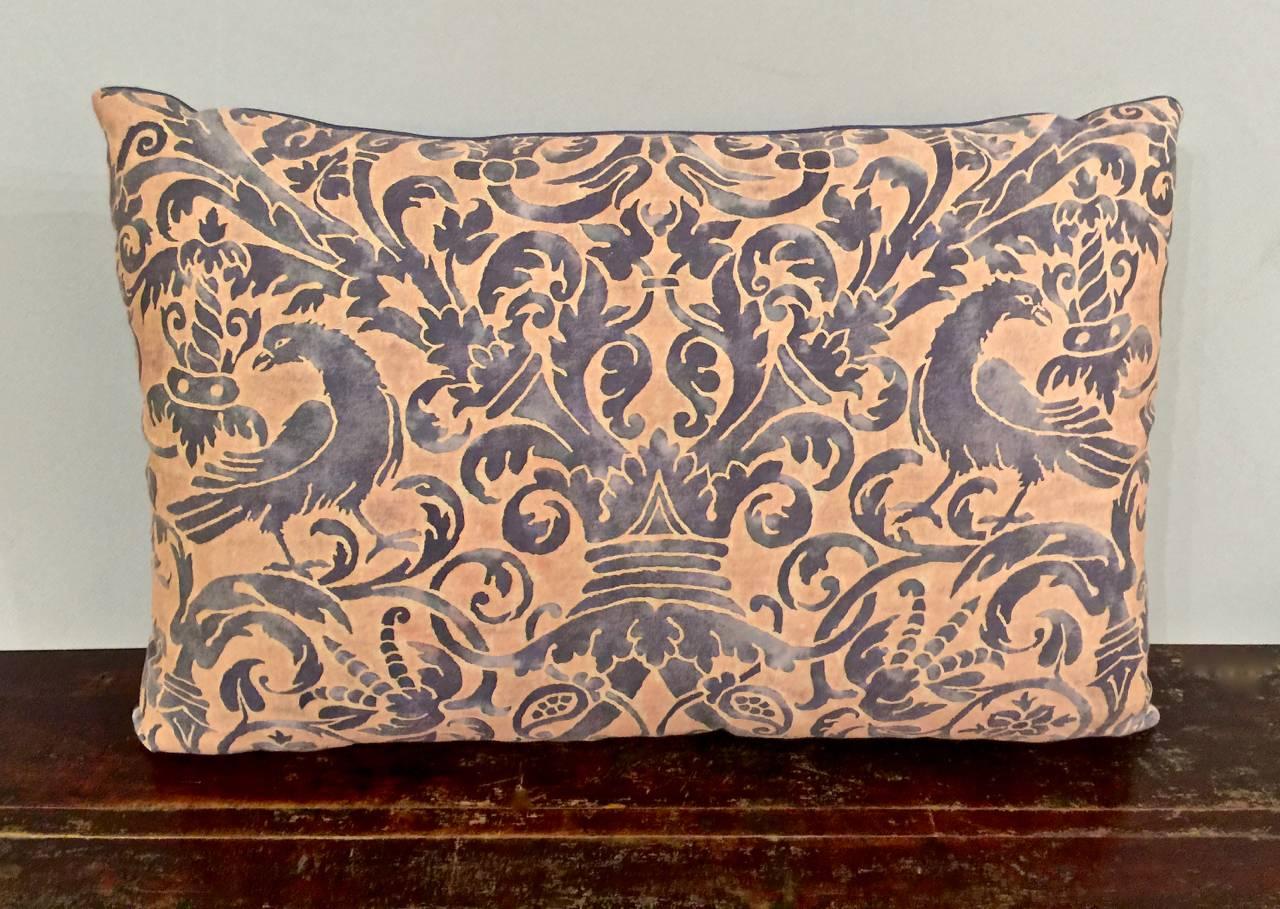 This is a gorgeous pair of vintage Fortuny pillows in the Ucelli pattern. The fabric dates to the late 1950s and is in an unusual color way of midnight blue (almost purple) and mauve. These shades are an unusual combination for Fortuny and are