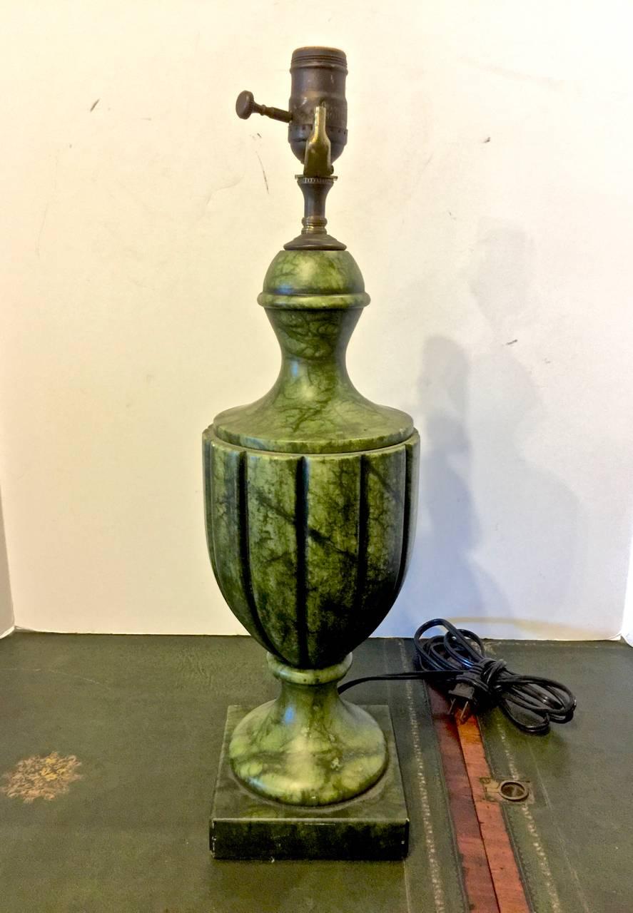 The deep green of these Mid-Century lamps makes them a stand-out. The lamps are carved urn-form Italian alabaster and date to the 1950s. Height measurement is to bases of socket.