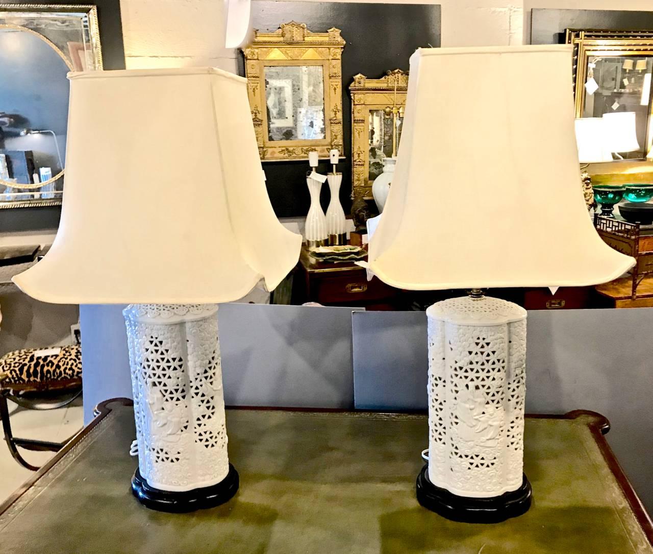 Great pair of Italian chinoiserie--blanc de chine style--circa 1960 Italian reticulated pottery lamps. The pagoda shades add just a little extra to the look.