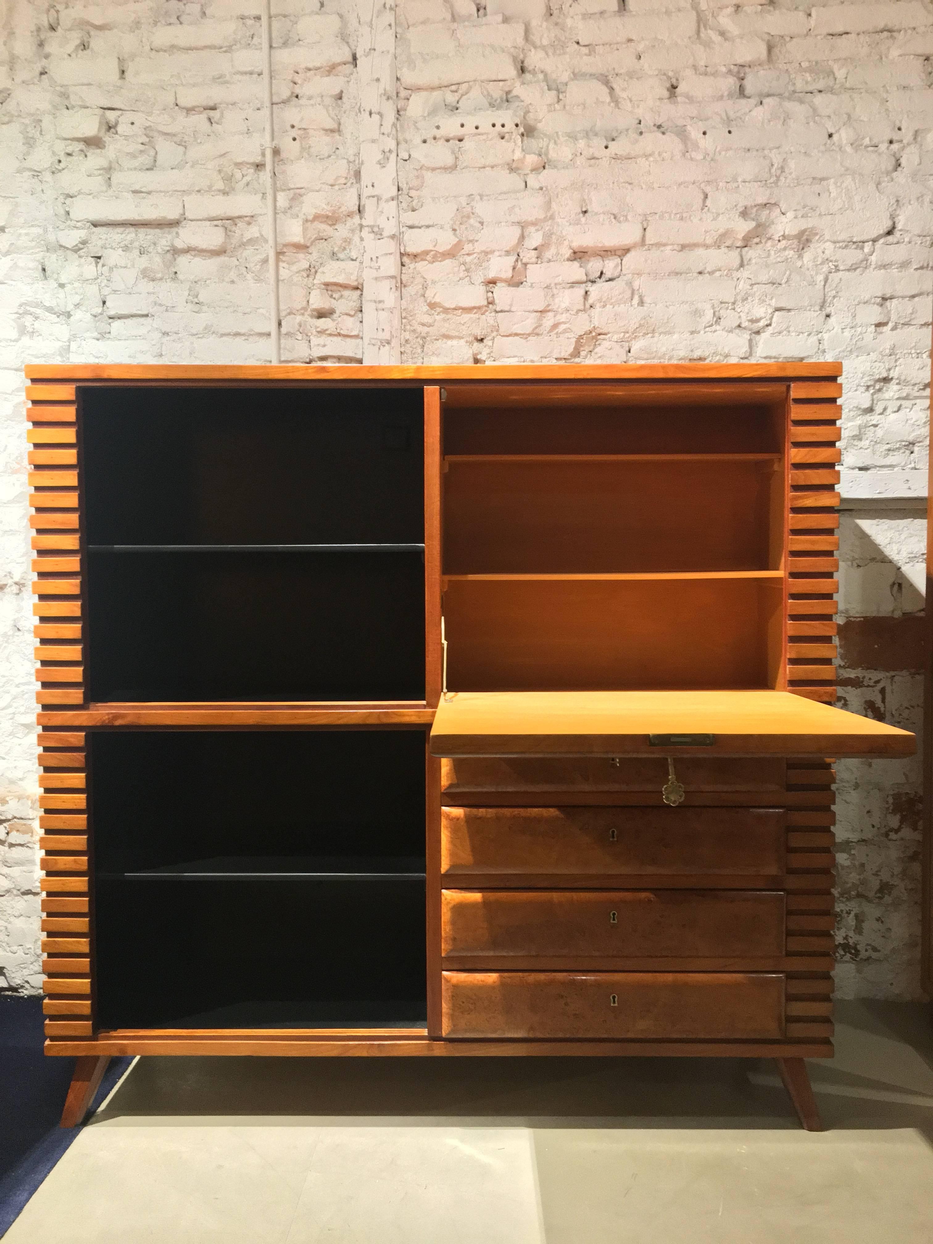 Amazing cabinet secretary bureau, design art deco, 1940 period. Woods: thuja, cherry, mahogany. Four drawers. One folding door. Very capacious. Please take note: in the black part (on the left side) there is a a cap on the hole because of in the
