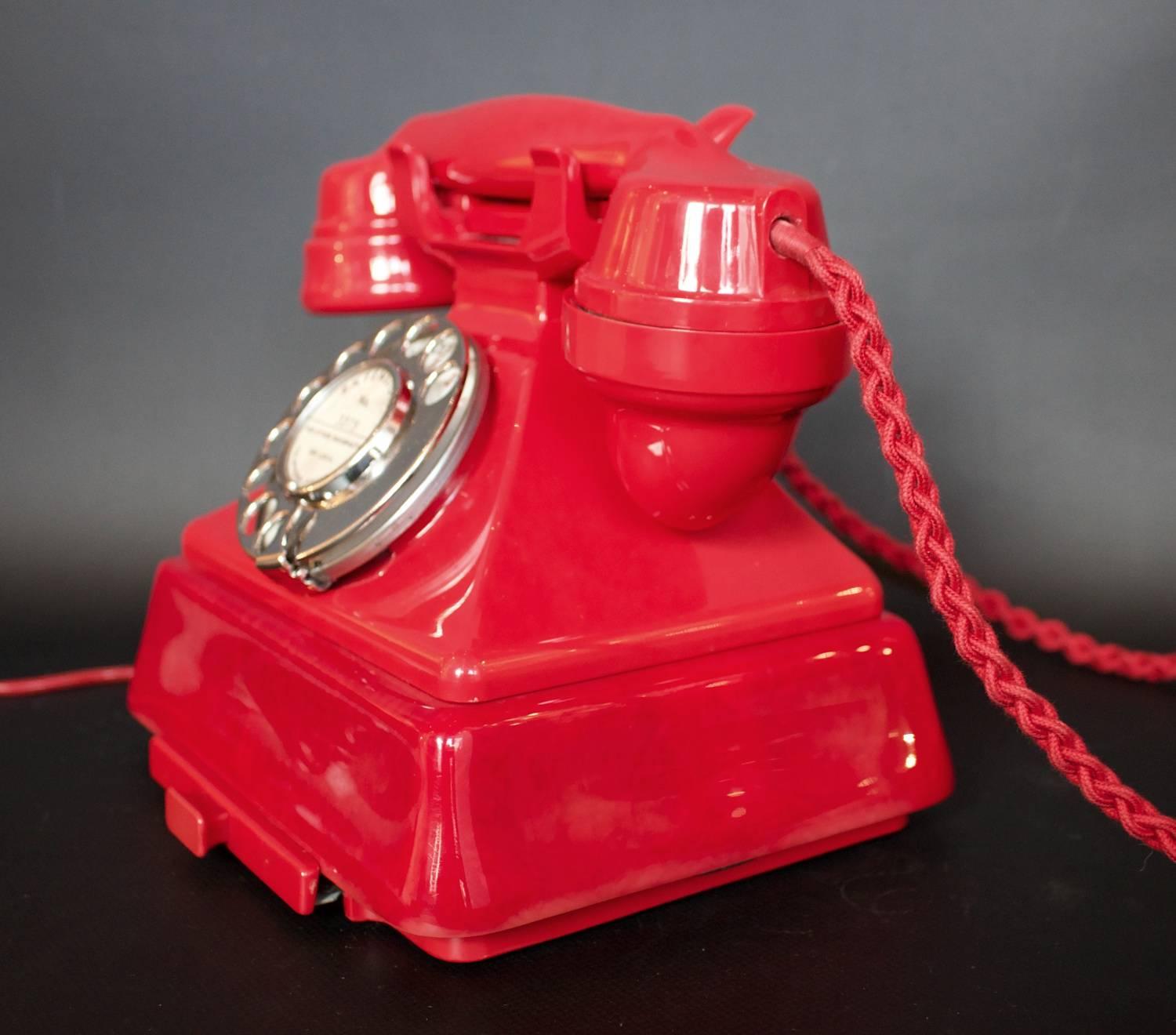 red bakelite telephone