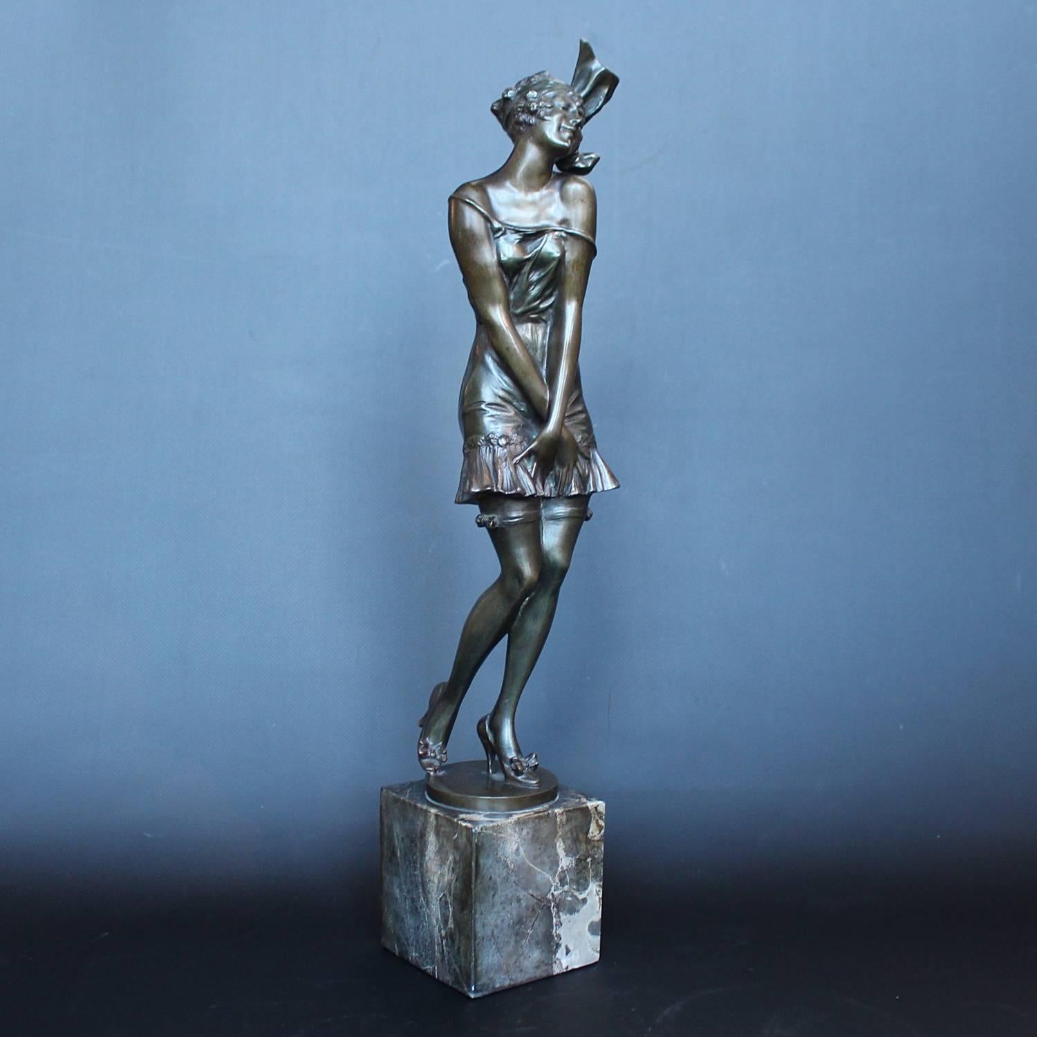 Girl in stockings, a patinated bronze figure by Bruno Zach (1891-1935). Depicts a scantily clad young lady in stockings, set over a marble plinth. 
Signed Zach to bronze.

 