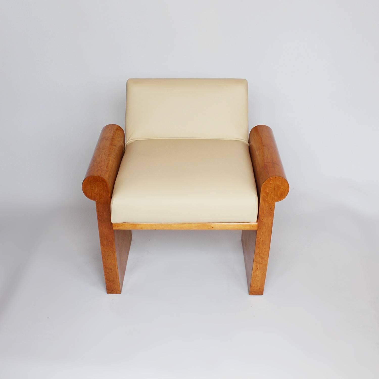 An Art Deco stool designed by Ray Hille. Birds eye maple with scrolled hand rests and an angled seat back. Upholstered in cream leather.

Dimensions: H 62cm, W 64cm, D 55cm, Seat H 45cm, Seat D 40cm

Origin: English

Date:  circa 1930

Item No: