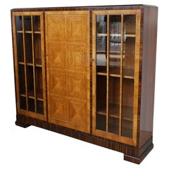 An Art Deco Walnut and Macassar Ebony Cabinet by Heal's of London
