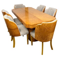 An Original English Art Satinwood Dining Table and Chairs
