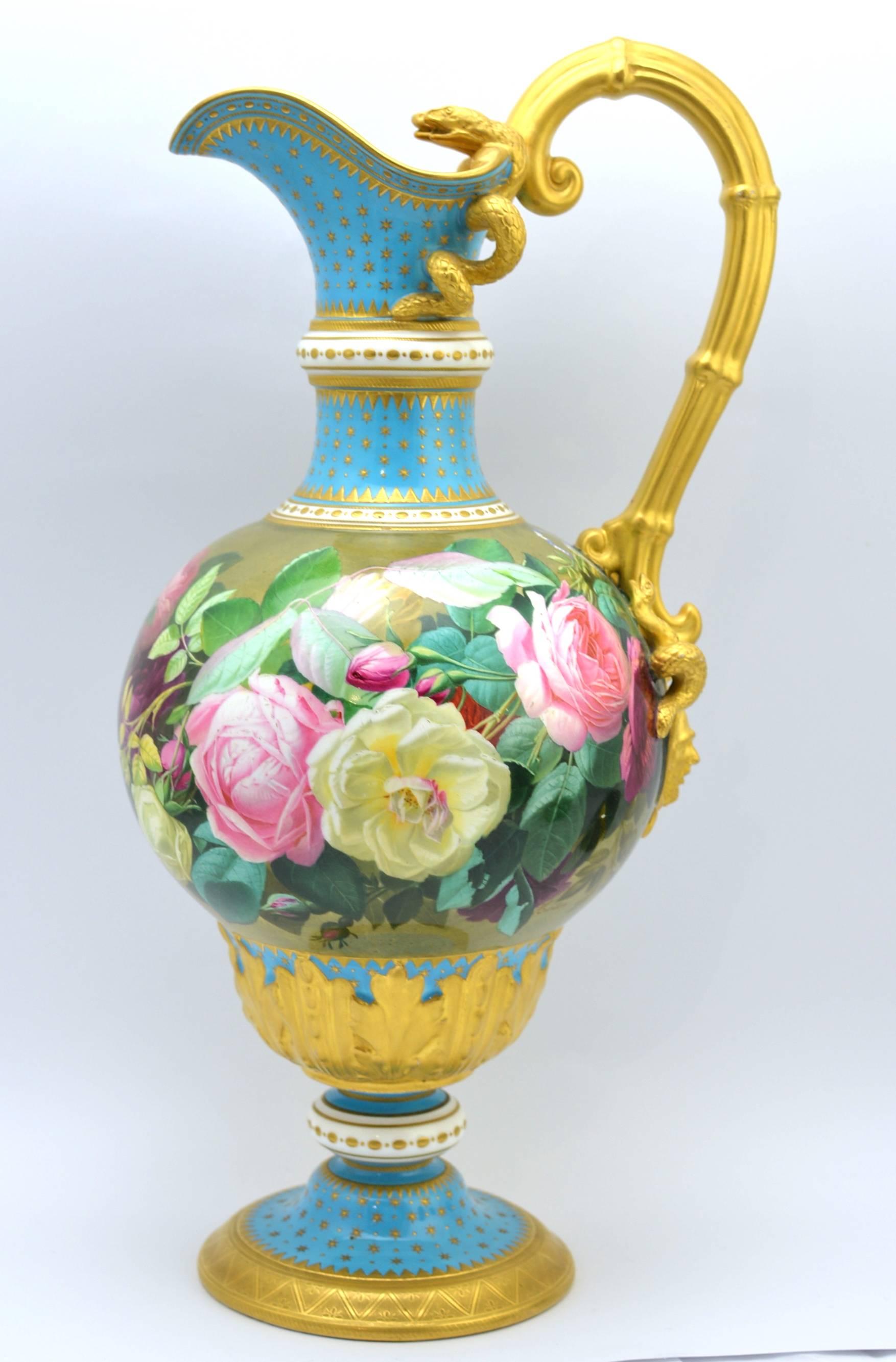 A fine and rare Copeland ewer, hand-painted by Charles Ferdinand Hürten, circa 1865

the ewer of neoclassical form, the gilded handle applied with a human mask and two serpents at the lower terminal, two more serpents at the upper terminal with
