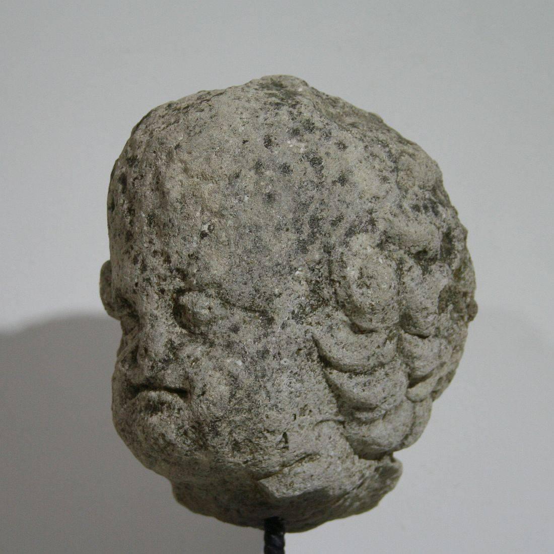 17th Century 17th-18th Century French Weathered Carved Stone Head of an Angel