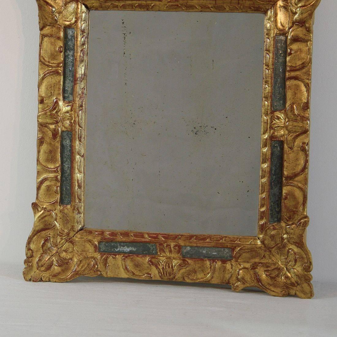 Carved Small Early 18th Century French Louis XIV Baroque Giltwood Mirror
