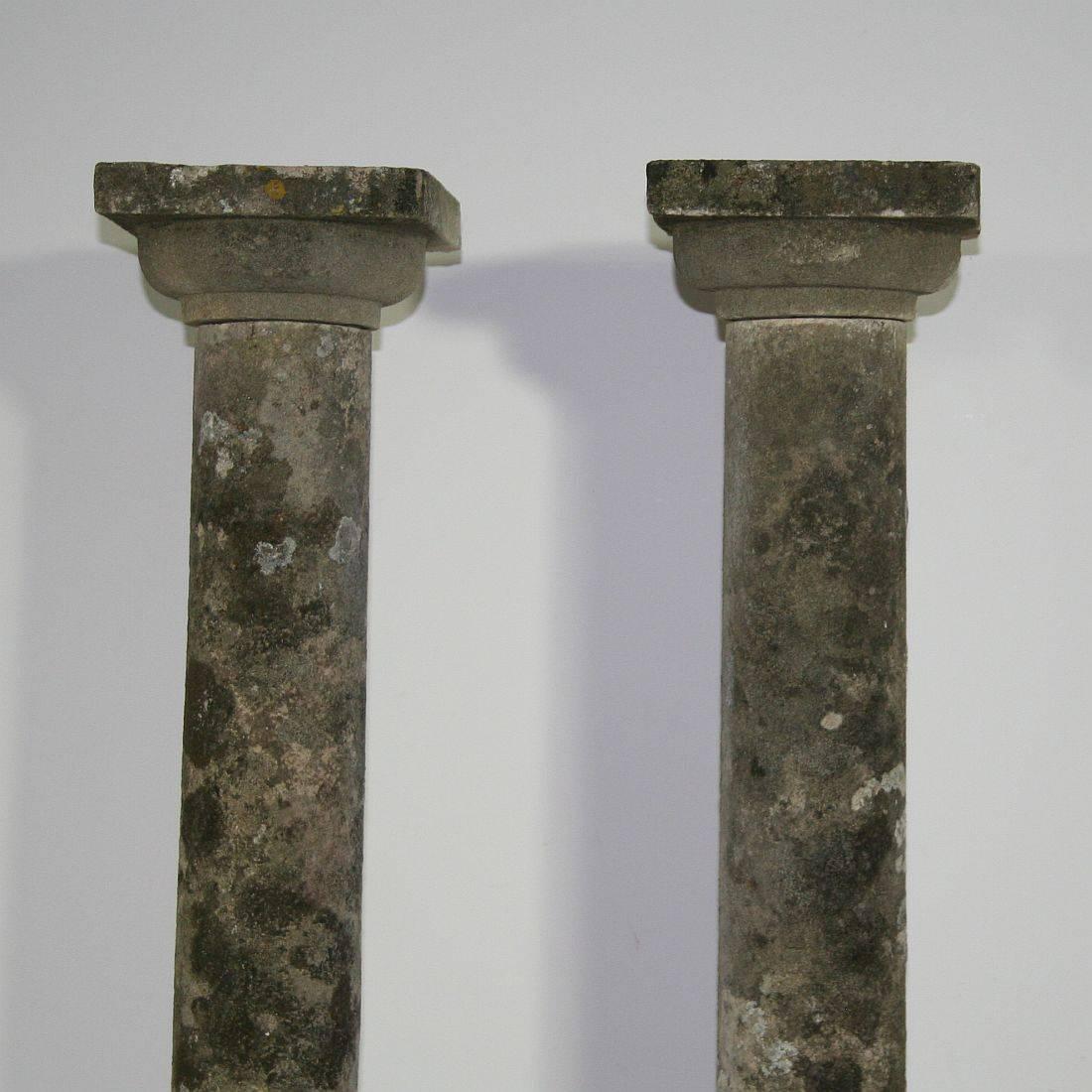 Pair of two beautiful weathered white stone columns of a nice size. Hand-carved. Weathered and small old repair.