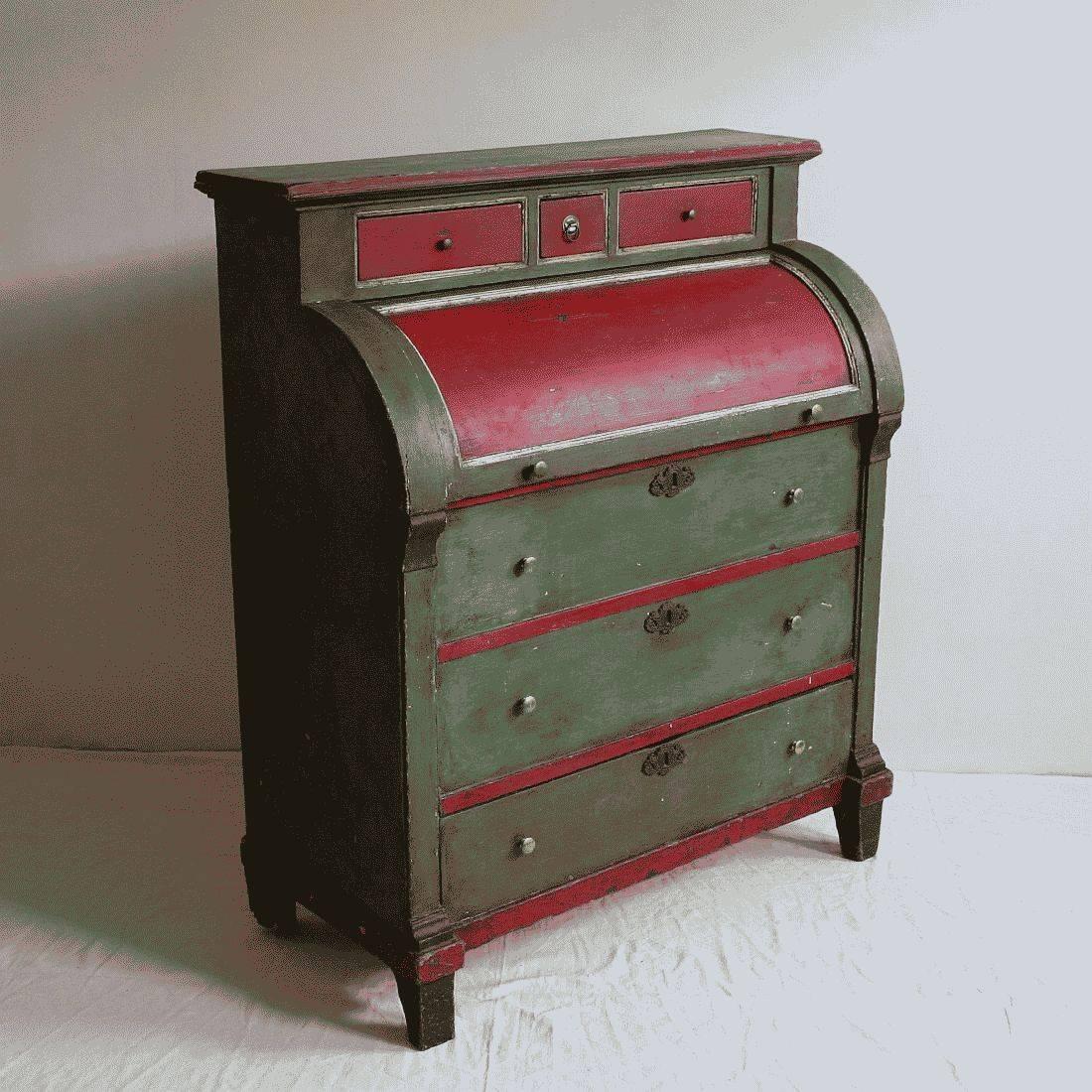Unique and very rare Dutch folkart piece with its original paint and patina. It's a chest of drawers for use of storing barley in the form of a secretaire. On top three small drawers. Behind the sliding valve two troughs and down one drawer. Ideal