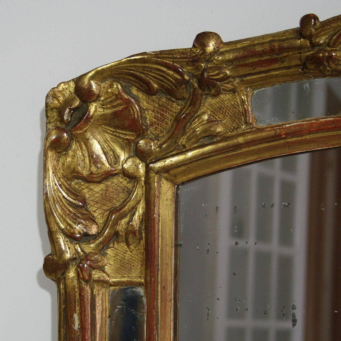 Beautiful 19th century gilded mirror, France, circa 1850, Original mirror-glass . Weathered, small losses.