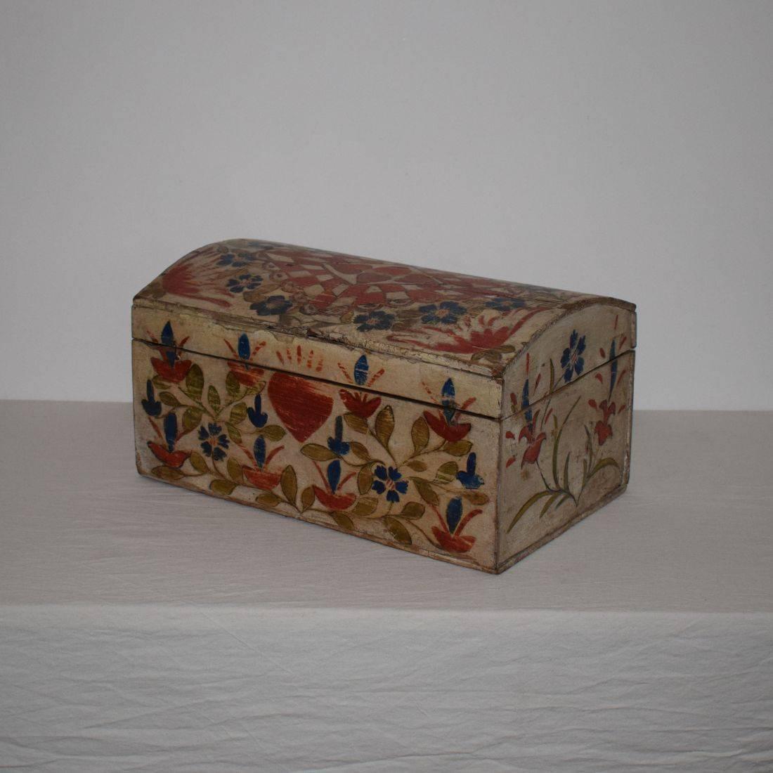 Beautiful painted wooden weddingbox with its original decor. Weathered and small repairs.