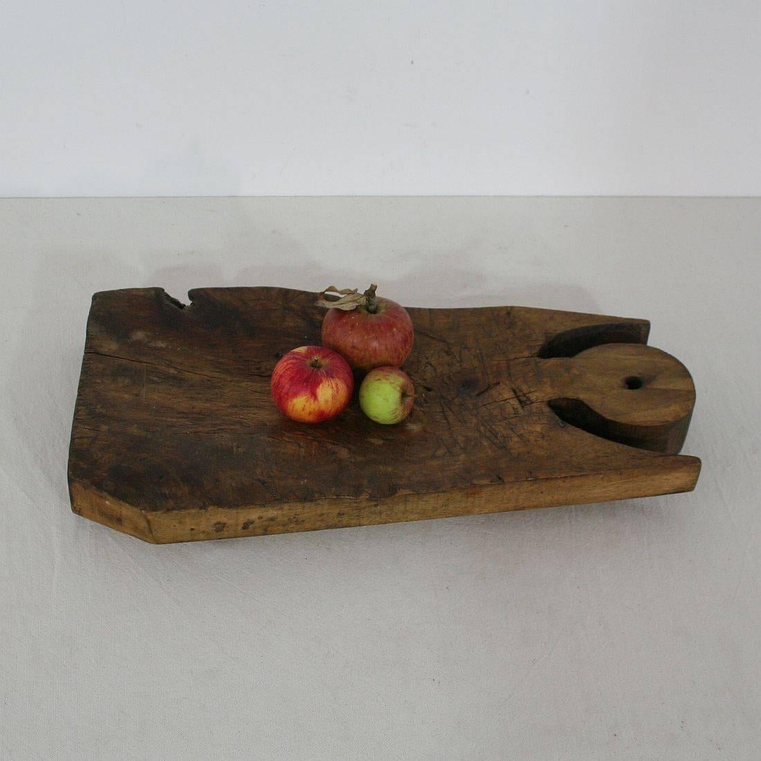 Unique wooden chopping-cutting board with a great and unusual form. Great statement on your counter-top
France, circa 1850-1900
Weathered.