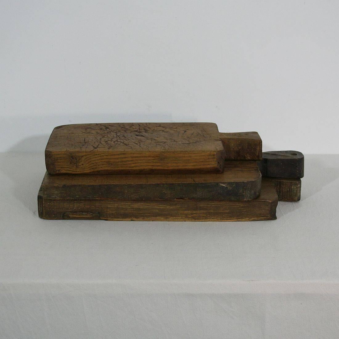 Beautiful small collection of three wooden chopping-cutting boards. Great statement on your counter-top
France, circa 1850-1900. Weathered.
Measure: H 37-45.5cm (14.5-18in), W 20-28cm (7.75-11.25in), D 2.5-4.5cm (1-1.75in) each, together: D