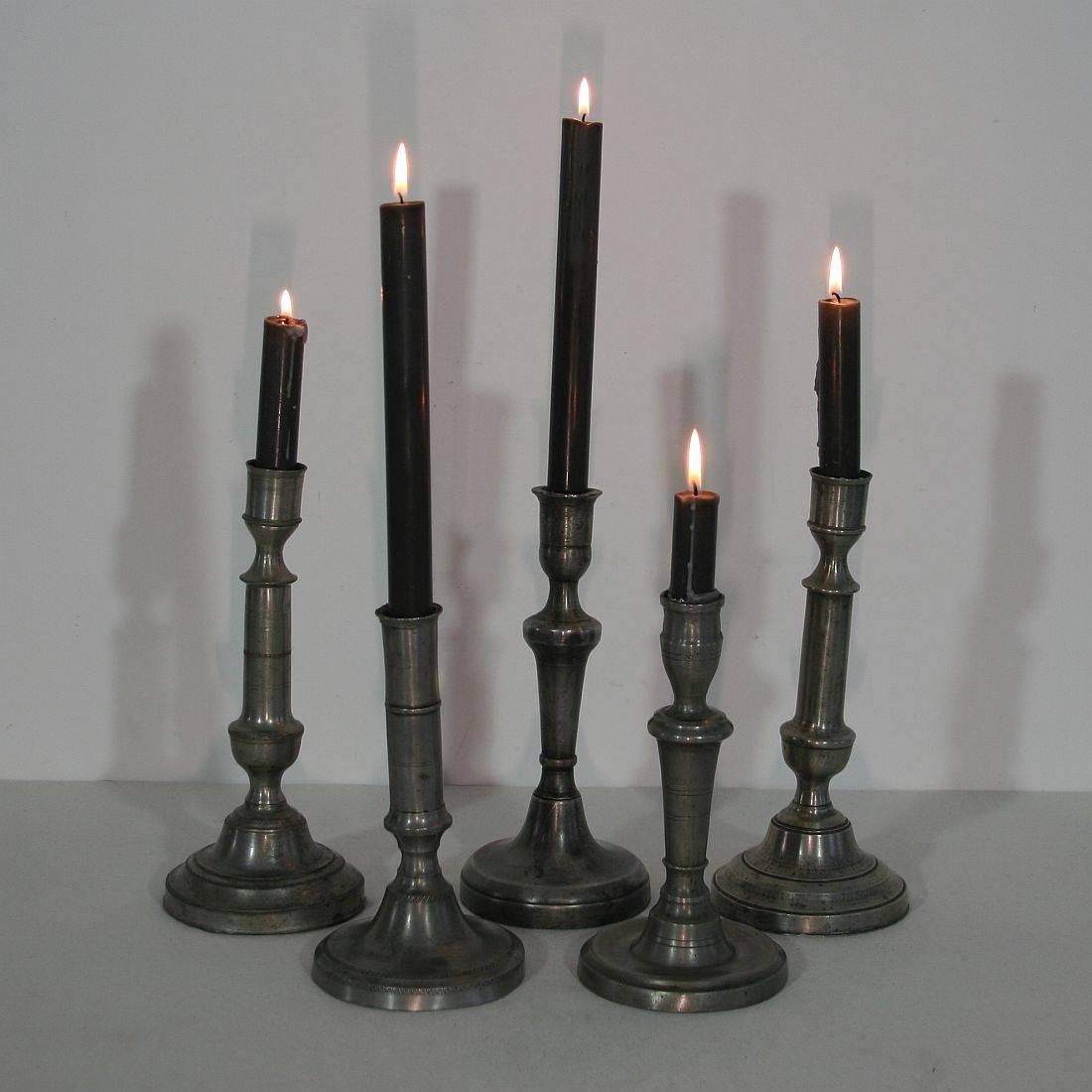 Amazing collection of five pewter candlesticks. They are all different and unique.
France, circa 1750-1850.
Weathered, dented and small losses but these imperfections help authenticate these items as they were utilitarian type pieces
Measures: H