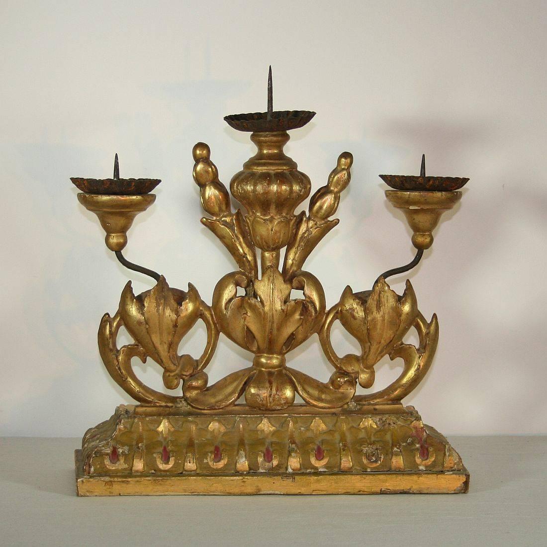 Unique giltwood Baroque candleholder
Italy, circa 1750
Weathered.
    