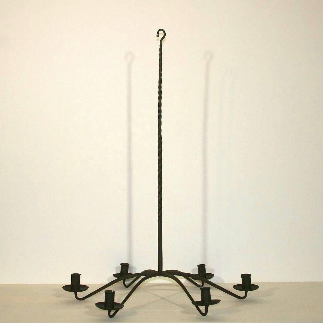 Unique hand-forged iron chandelier
France, circa 1750
Weathered but very good condition.
More pictures available on request.