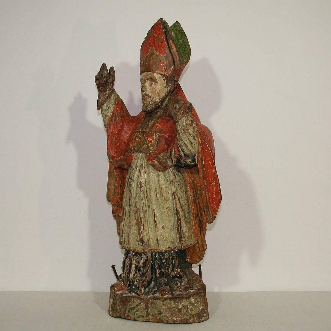 Beautiful hand-carved Saint Nicholas with its stunning old colors,
France, circa 1650-1700.
Weathered, small losses.
More pictures are available on request.