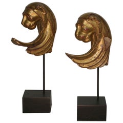 Pair of Late 18th Century French Giltwood Lion Head Ornaments