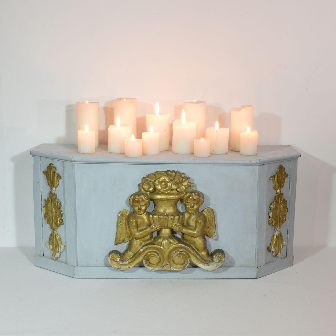 Wonderful neoclassical carved wooden altar with beautiful gilded angels.
Italy, circa 1760-1780. Weathered, small losses and old repairs.