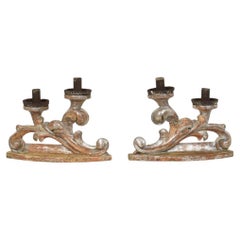 Couple of 18th Century Italian Baroque Carved Wooden And Silvered Candleholders
