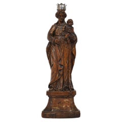 Madonna con Bambino italiana d'epoca in legno dorato con corona d'argento, 1650-1750 circa