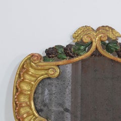 Specchio italiano del XVIII secolo in legno dorato e policromo con vetro al mercurio