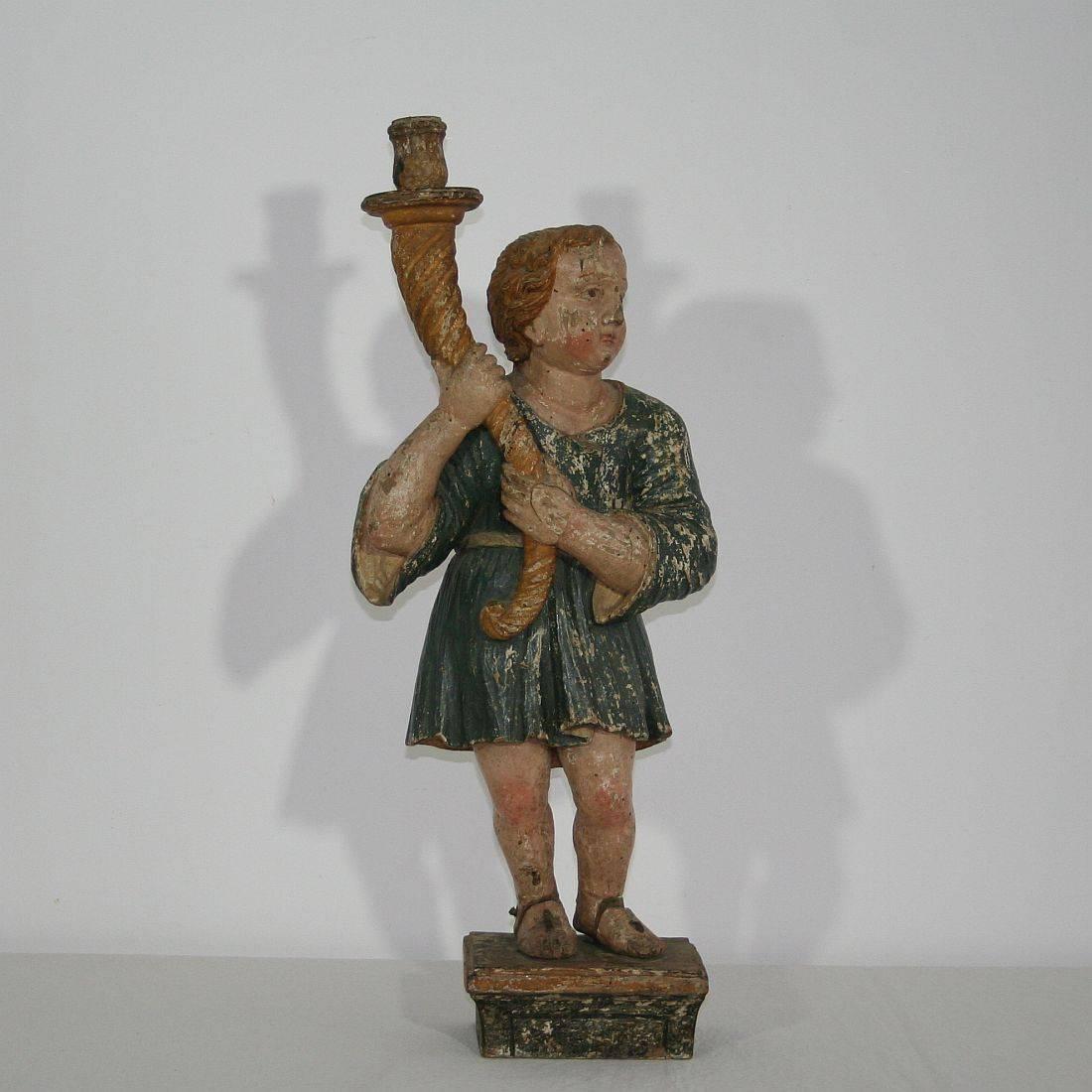 Unique carved wooden angel with a candleholder. Beautiful traces of original paint and antique repairs
Italy circa 1650-1700. Weathered, small losses and antique repairs. More pictures are available on request.