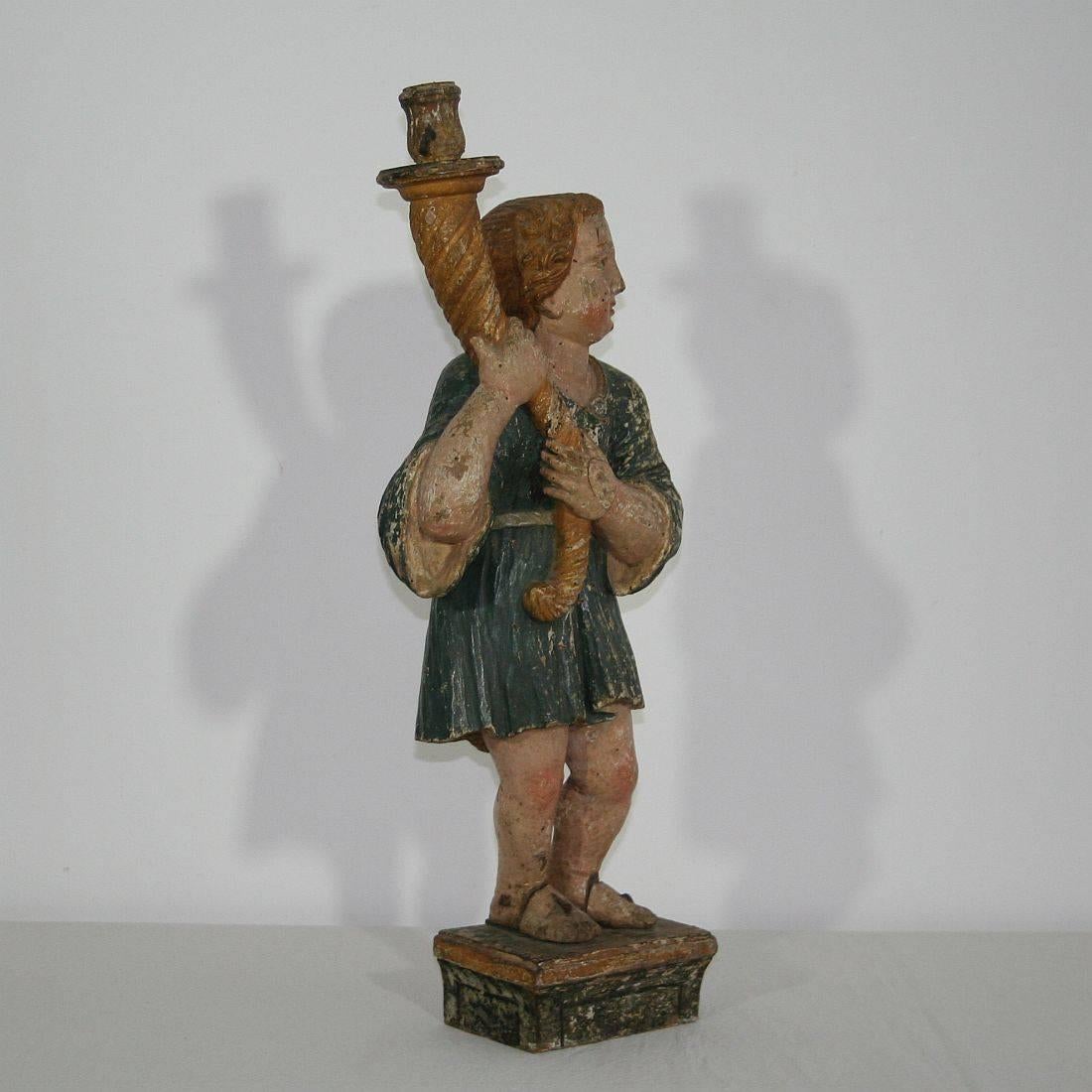 European 17th Century, Early Baroque Carved Wooden Angel with a Candleholder