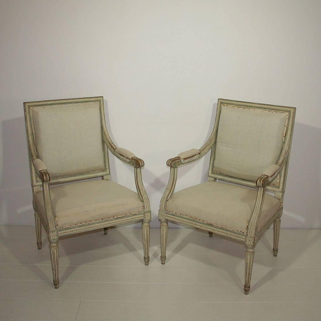 Great pair of Louis XVI style chairs with beautiful color, patina,
France, circa 1900. They stand ready for re-upholstery. 
H:92cm (36,25in) W:59,5cm (23,5in) D:57cm (22,5in) seat H:43cm(17in)
Despite of their age in a good condition. traces of