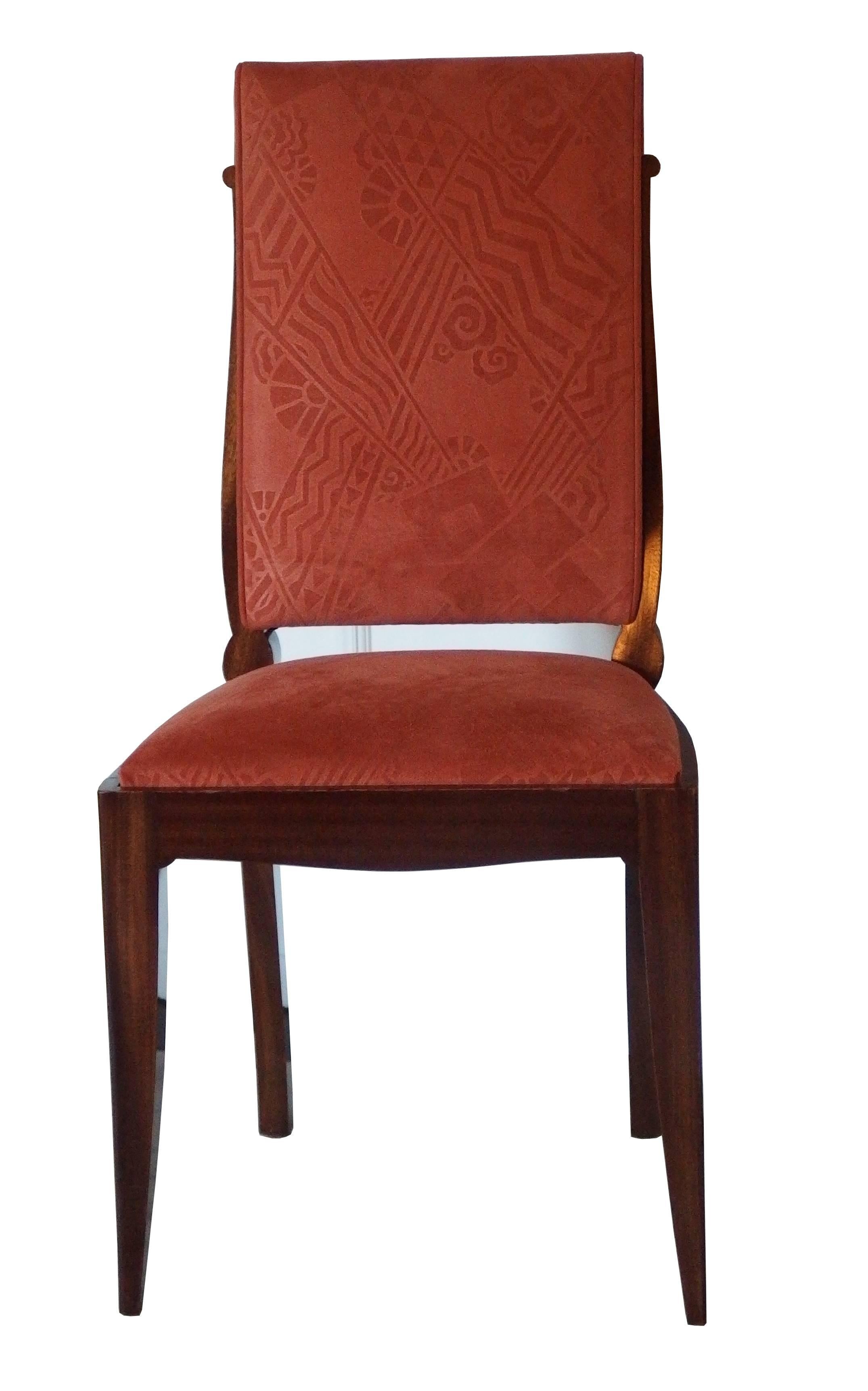 Set of six French mahogany Art Deco dining chairs designed by Gaston Poisson.
The chairs were upholstered in the 1980s with an orange suedine fabric which is in good condition.
