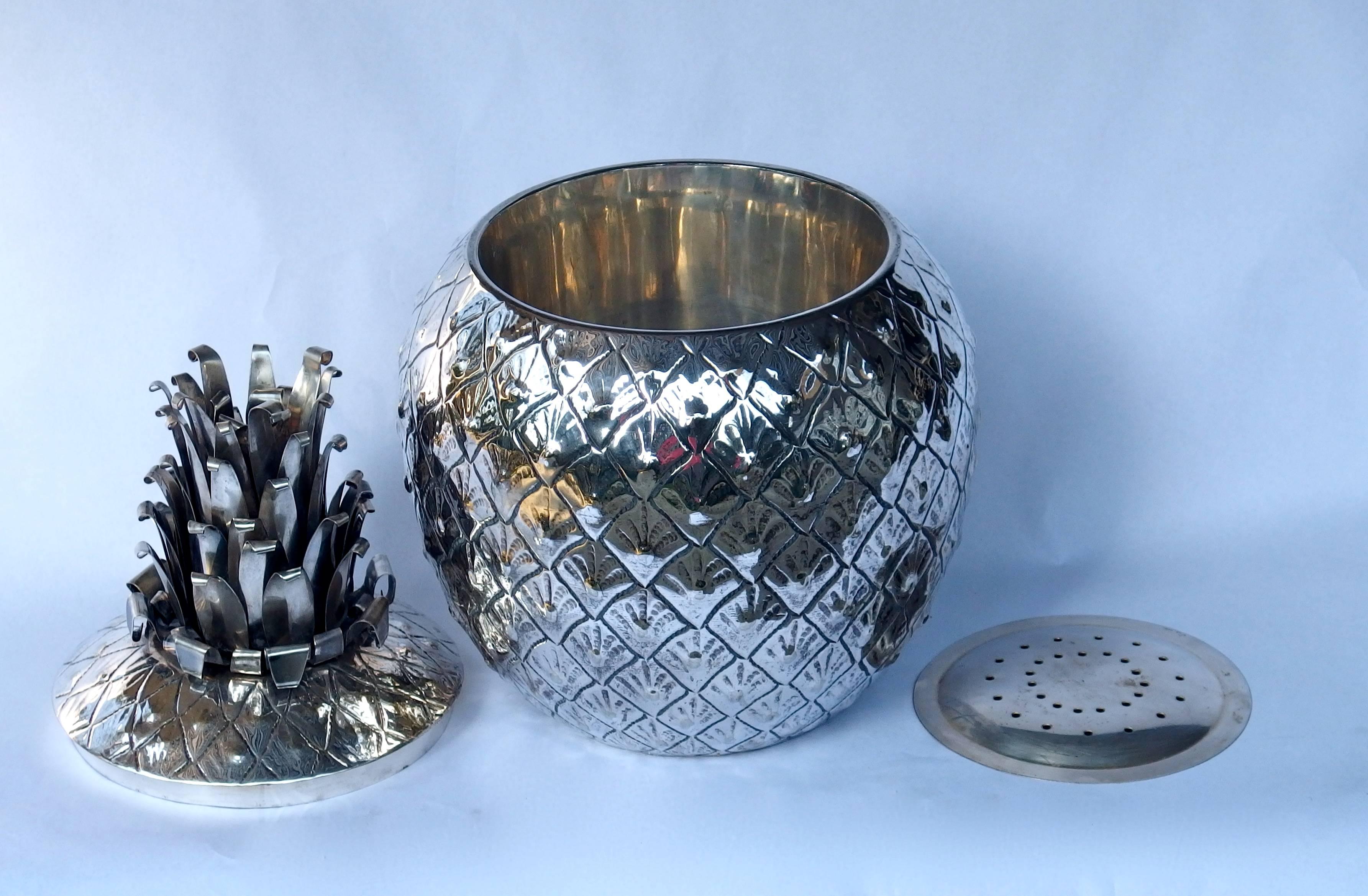 Large silver plated pineapple ice bucket.