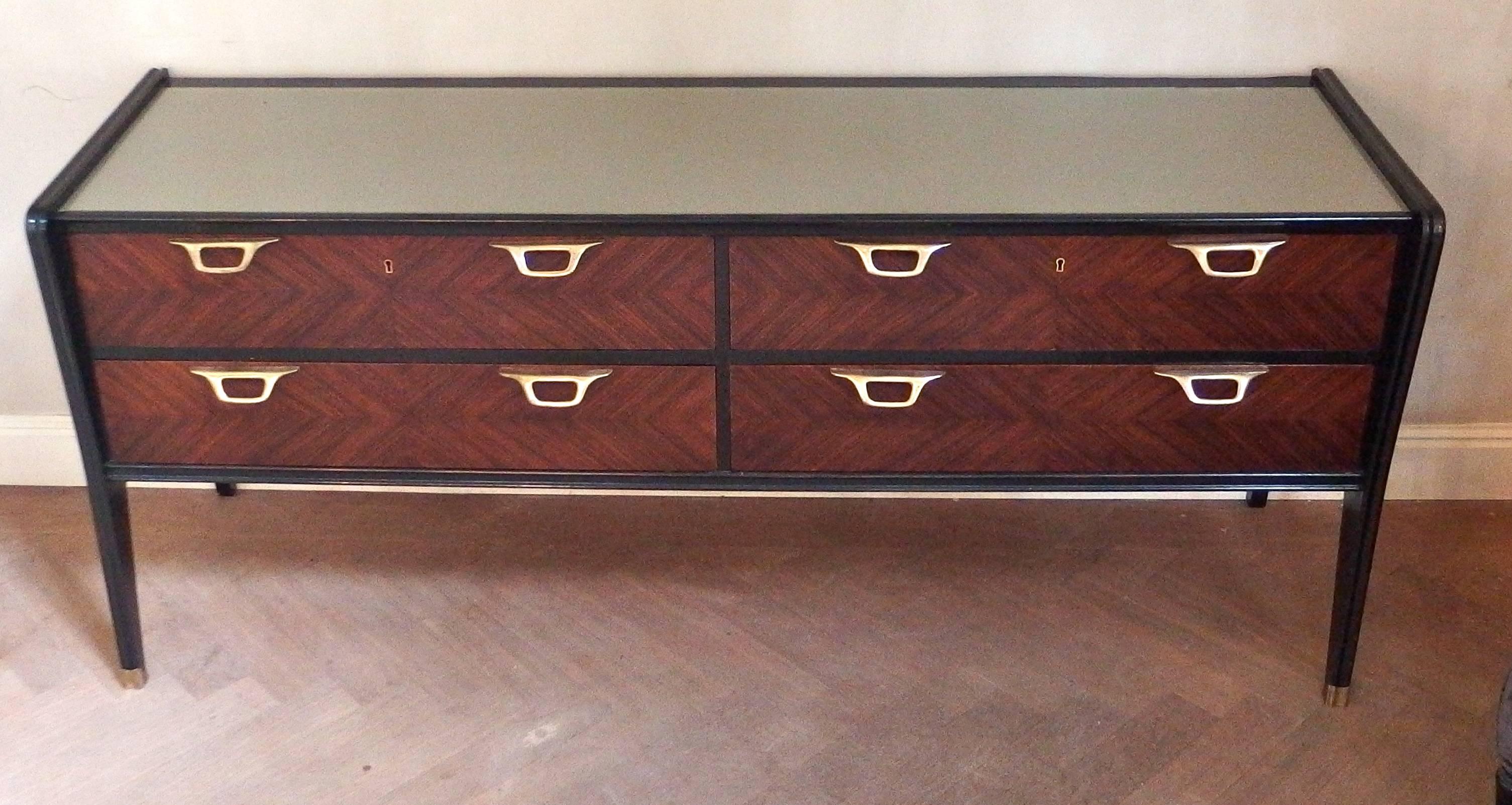 Beautiful Italian rosewood sideboard with herringbone parquetry front, silver-grey glass top and brass handles and sabots, attributed to Paolo Buffa.